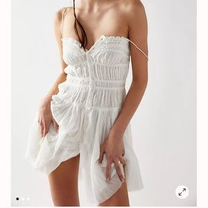 Free people brand new with tags!! Size small white slip dress